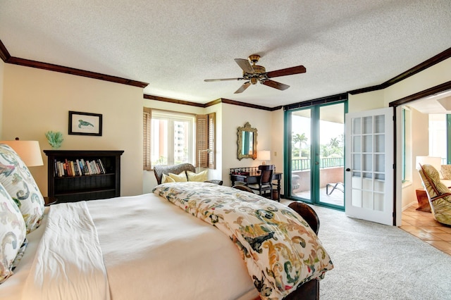 carpeted bedroom featuring french doors, a textured ceiling, crown molding, a ceiling fan, and access to exterior