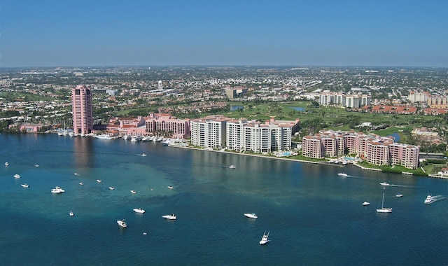 drone / aerial view with a water view and a view of city