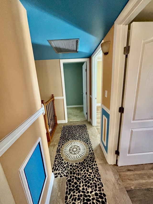 corridor featuring visible vents