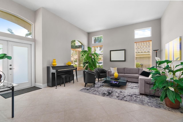 19699 Dinner Key Dr, Boca Raton, FL 33498 - tiled living room with a towering ceiling and baseboards