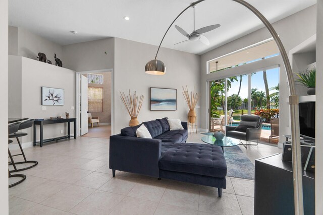 19699 Dinner Key Dr, Boca Raton, FL 33498 - living room featuring recessed lighting, a ceiling fan, a towering ceiling, and light tile patterned floors