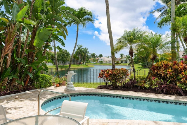 19699 Dinner Key Dr, Boca Raton, FL 33498 - view of pool featuring a fenced in pool, a water view, and fence