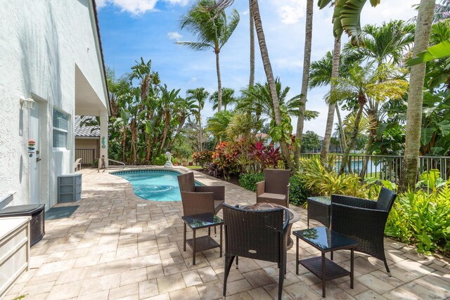 19699 Dinner Key Dr, Boca Raton, FL 33498 - exterior space with fence, a pool, and a patio