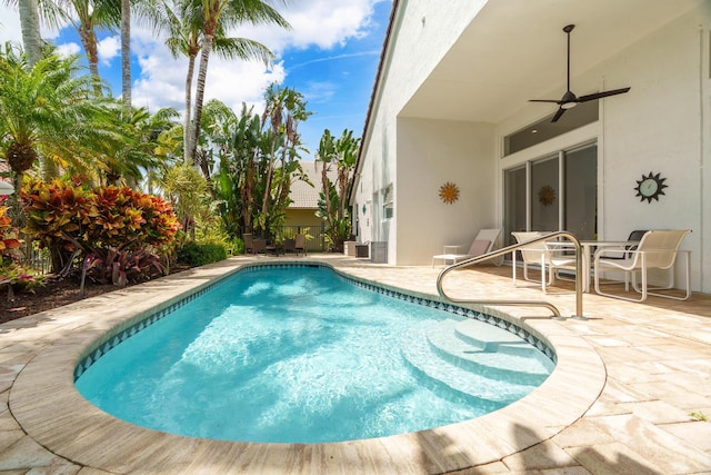 19699 Dinner Key Dr, Boca Raton, FL 33498 - pool with outdoor dining space, a patio area, and a ceiling fan