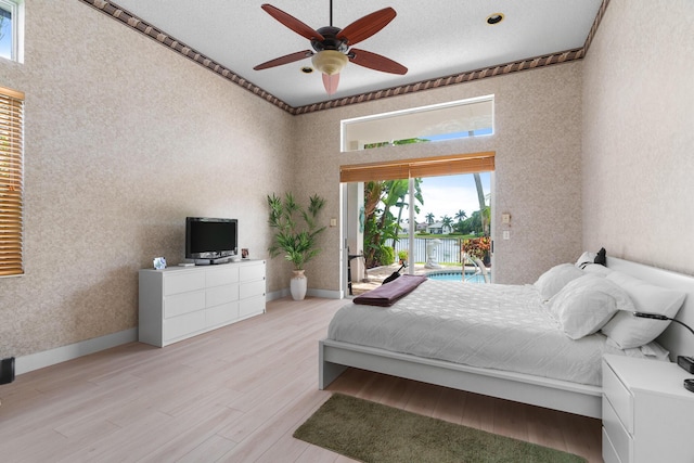 19699 Dinner Key Dr, Boca Raton, FL 33498 - bedroom featuring ceiling fan, baseboards, access to outside, and light wood-type flooring