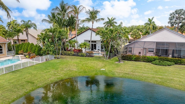 19699 Dinner Key Dr, Boca Raton, FL 33498 - view of yard featuring fence, a fenced in pool, and a water view