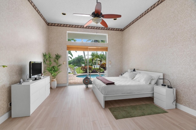 19699 Dinner Key Dr, Boca Raton, FL 33498 - bedroom featuring light wood-type flooring, access to exterior, a ceiling fan, and baseboards