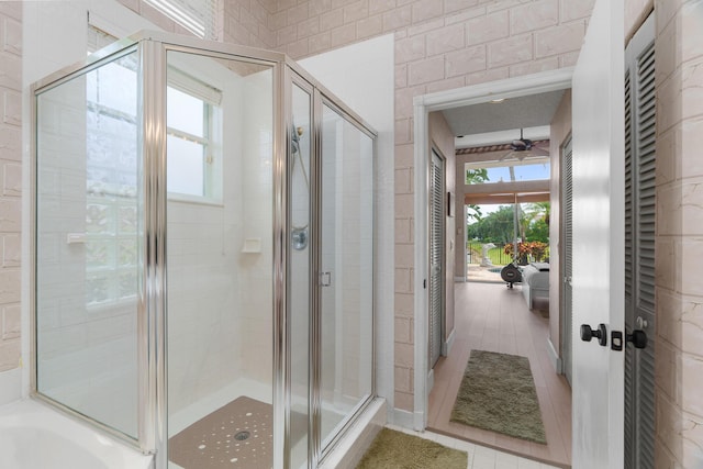 19699 Dinner Key Dr, Boca Raton, FL 33498 - bathroom with a shower stall and ceiling fan