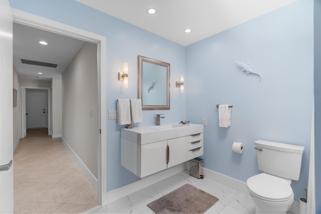 19699 Dinner Key Dr, Boca Raton, FL 33498 - bathroom featuring recessed lighting, visible vents, toilet, and baseboards