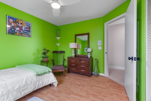 19699 Dinner Key Dr, Boca Raton, FL 33498 - bedroom with baseboards, a ceiling fan, and wood finished floors