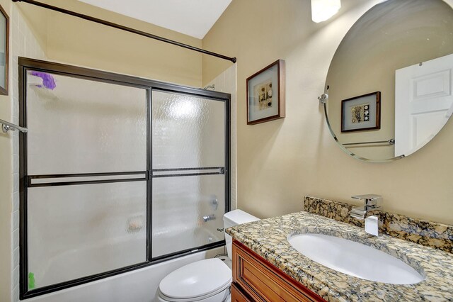 8326 Mooring Cir, Boynton Beach, FL 33472 - full bathroom featuring vanity, toilet, and combined bath / shower with glass door