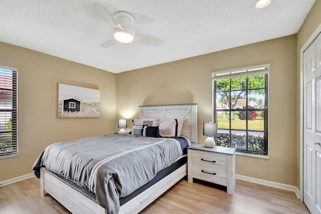 8326 Mooring Cir, Boynton Beach, FL 33472 - bedroom with light wood-style floors, baseboards, ceiling fan, and recessed lighting