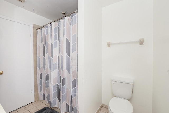 full bath with tile patterned flooring, a shower with curtain, and toilet
