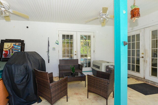 view of patio / terrace with french doors and a ceiling fan