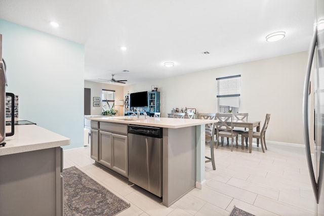 1908 Harding St, Lake Worth, FL 33460 - kitchen featuring dishwasher, fridge, a ceiling fan, healthy amount of natural light, and recessed lighting