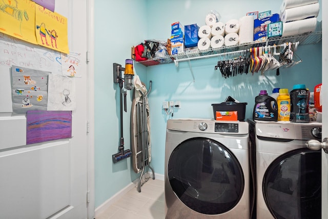 1908 Harding St, Lake Worth, FL 33460 - laundry room with washing machine and dryer and baseboards