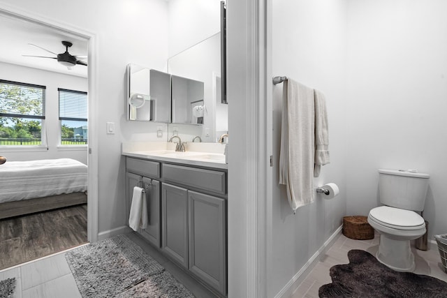 1908 Harding St, Lake Worth, FL 33460 - bathroom with double vanity, ceiling fan, and ensuite bathroom