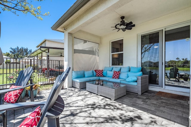 1908 Harding St, Lake Worth, FL 33460 - wooden deck with ceiling fan, an outdoor hangout area, and a patio area
