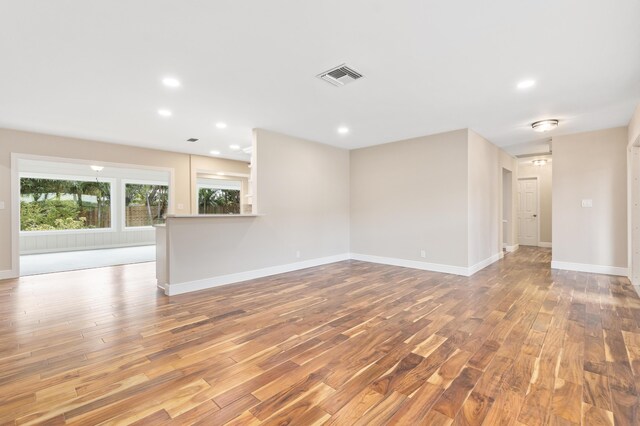 7 Riverview Dr, Sewalls Point, FL 34996 - unfurnished room featuring wood finished floors, baseboards, visible vents, and recessed lighting