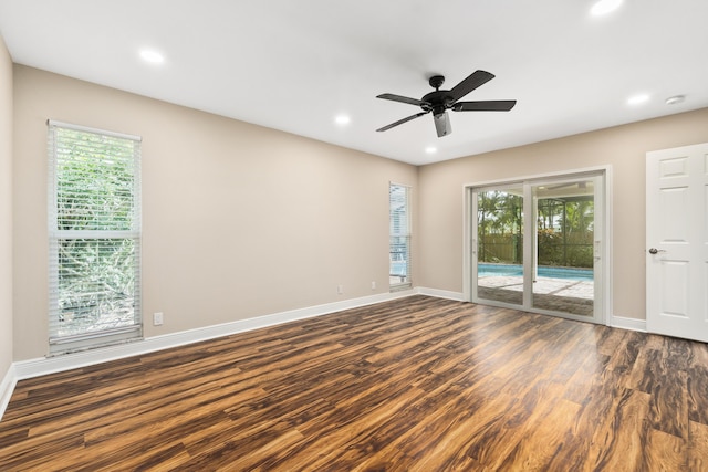 7 Riverview Dr, Sewalls Point, FL 34996 - spare room with plenty of natural light, dark wood-style floors, and baseboards