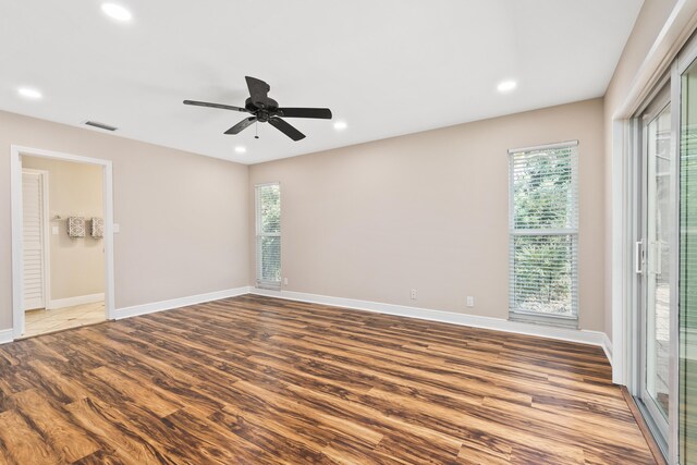 7 Riverview Dr, Sewalls Point, FL 34996 - unfurnished room with a wealth of natural light, visible vents, and wood finished floors