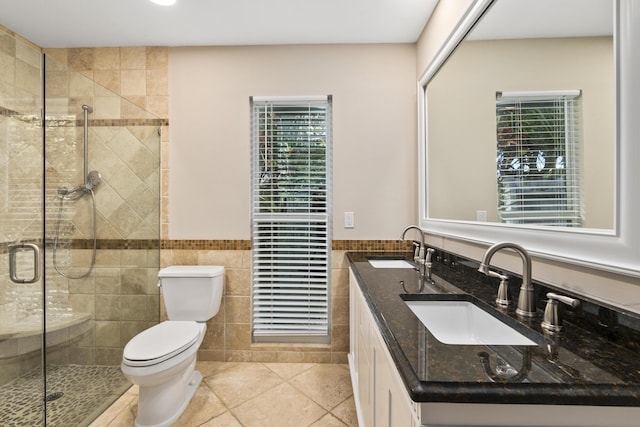 7 Riverview Dr, Sewalls Point, FL 34996 - full bathroom featuring a sink, tile walls, and a stall shower