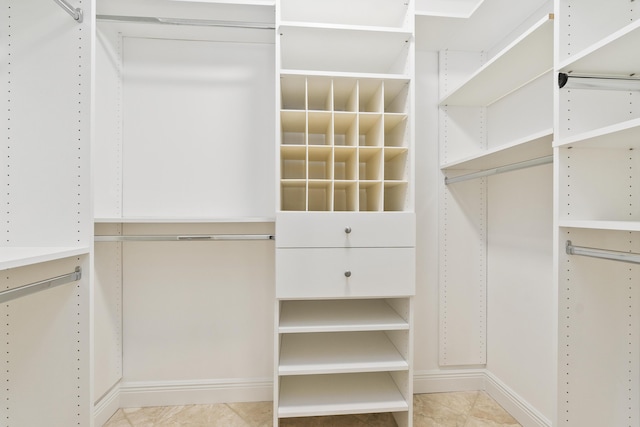 7 Riverview Dr, Sewalls Point, FL 34996 - spacious closet featuring tile patterned floors