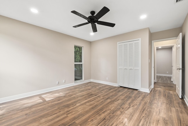 7 Riverview Dr, Sewalls Point, FL 34996 - unfurnished bedroom with a closet, visible vents, recessed lighting, wood finished floors, and baseboards