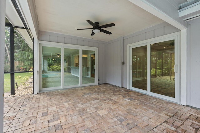 7 Riverview Dr, Sewalls Point, FL 34996 - unfurnished sunroom featuring ceiling fan