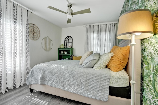 1013 Green Pine Blvd Unit A1, West Palm Beach, FL 33409 - bedroom featuring wood finished floors and ceiling fan