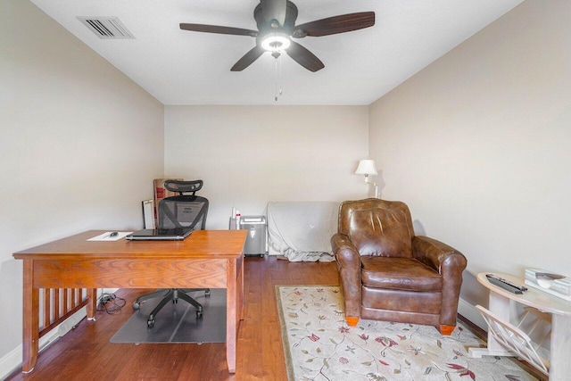 2020 Newhaven Ave, Wellington, FL 33414 - home office with wood finished floors, a ceiling fan, and baseboards