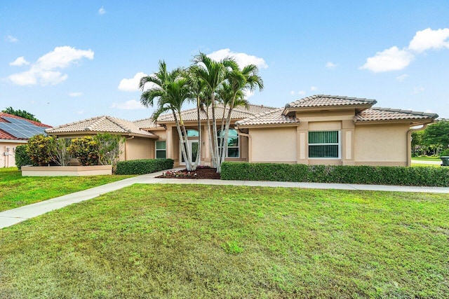 2020 Newhaven Ave, Wellington, FL 33414 - mediterranean / spanish-style house with stucco siding, a tile roof, and a front yard