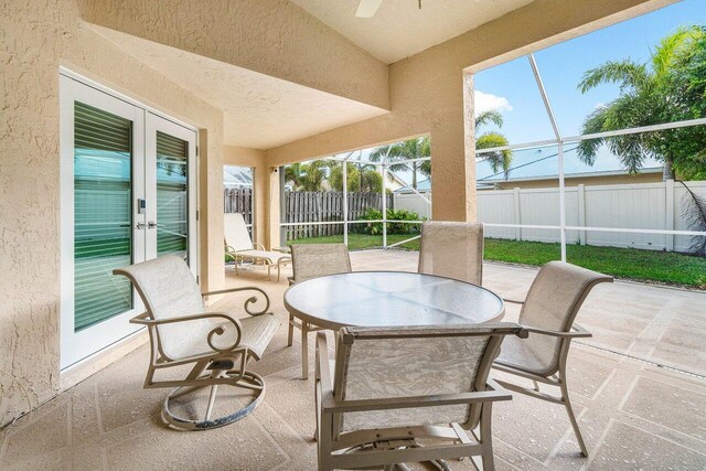 2020 Newhaven Ave, Wellington, FL 33414 - sunroom with a textured wall and french doors