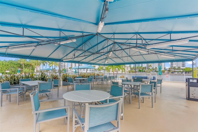 800 Parkview Dr Unit 826, Hallandale Beach, FL 33009 - view of patio / terrace featuring fence and outdoor dining space