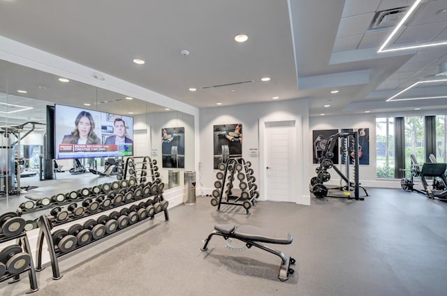 exercise room with visible vents, baseboards, and recessed lighting