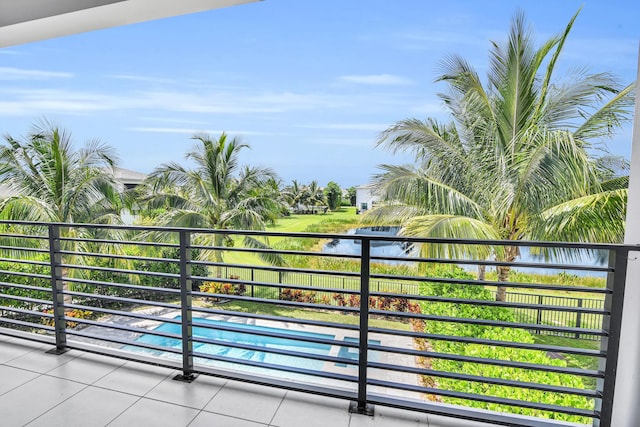 balcony featuring a water view