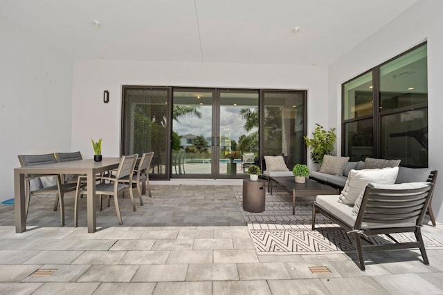 view of patio / terrace featuring outdoor dining space and outdoor lounge area
