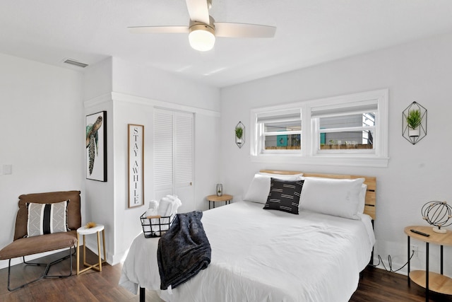 1021 N Palmway, Lake Worth Beach, FL 33460 - bedroom with dark wood finished floors, a closet, multiple windows, and ceiling fan
