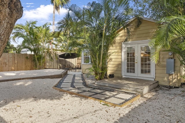 1021 N Palmway, Lake Worth Beach, FL 33460 - rear view of house featuring french doors and a patio