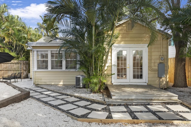 1021 N Palmway, Lake Worth Beach, FL 33460 - view of outbuilding with french doors and central AC unit