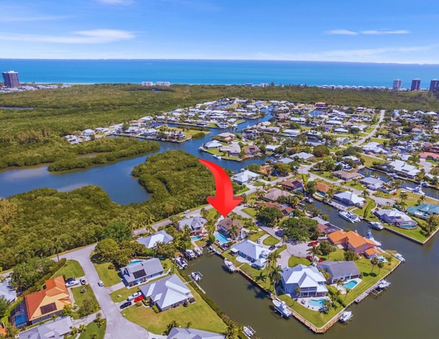 121 Queen Eugenia Ct, Hutchinson Island, FL 34949 - bird's eye view featuring a water view and a residential view