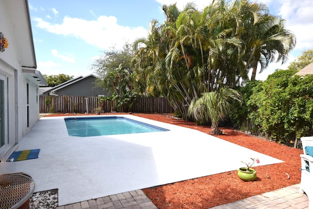 3030 Phoebe Ln, Delray Beach, FL 33444 - view of swimming pool with a fenced backyard and a patio area