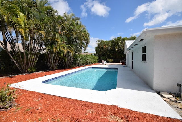 3030 Phoebe Ln, Delray Beach, FL 33444 - view of swimming pool with a patio and a fenced in pool