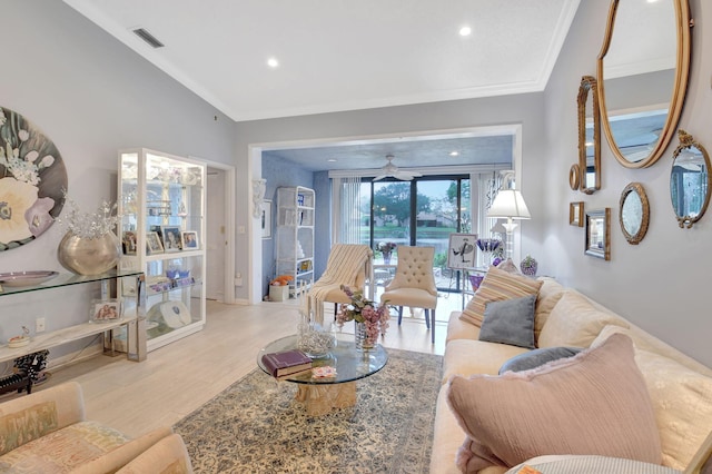 living room featuring baseboards, ornamental molding, recessed lighting, visible vents, and wood finished floors