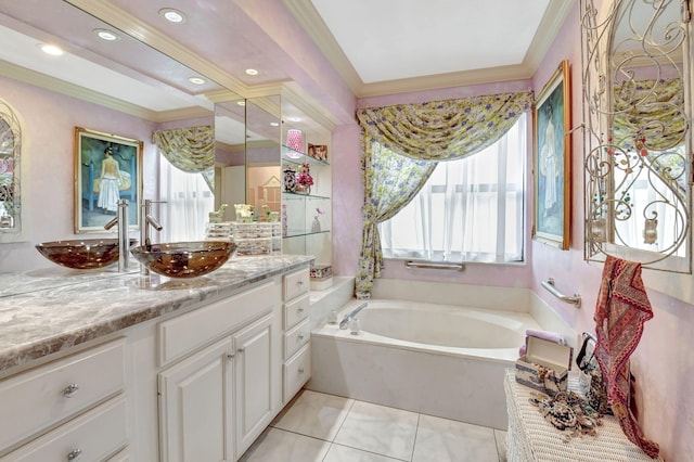 bathroom with vanity, a bath, and ornamental molding