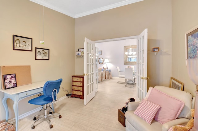 home office featuring light wood-style floors, french doors, crown molding, and baseboards