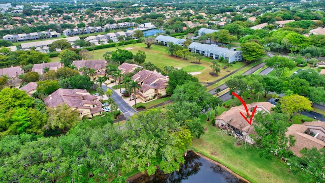 bird's eye view with a water view and a residential view