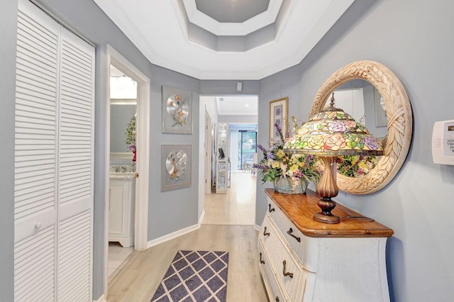 entrance foyer with light wood finished floors and baseboards