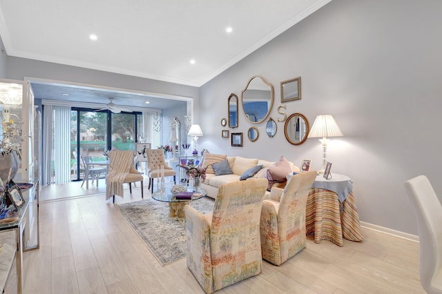 living area featuring light wood-style floors, a ceiling fan, ornamental molding, recessed lighting, and baseboards