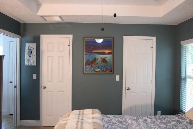 bedroom featuring visible vents